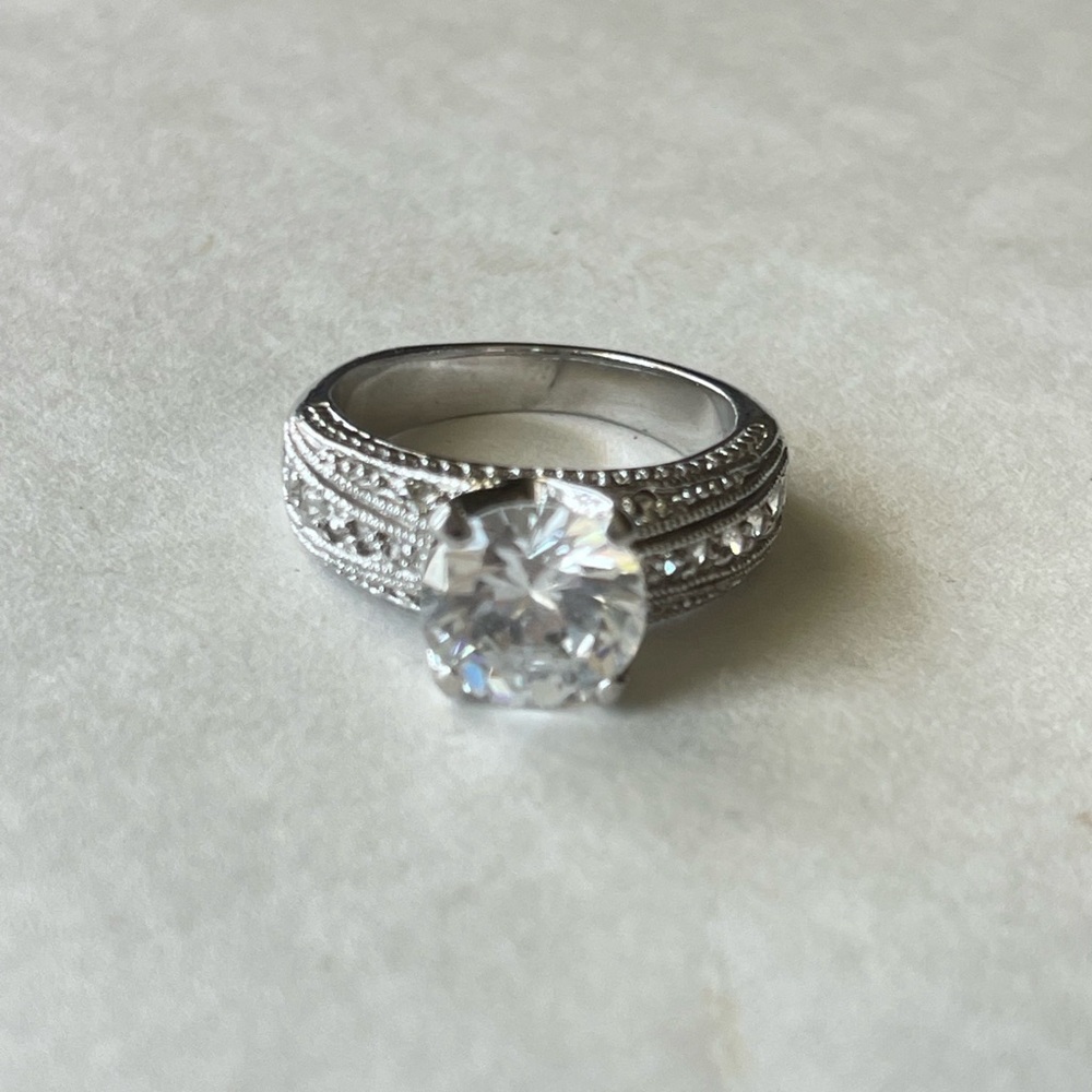 Silver and White Ring with Clear Gemstone and Milgrain Detailing